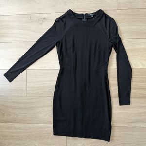 Black cocktail dress with sheer cutouts